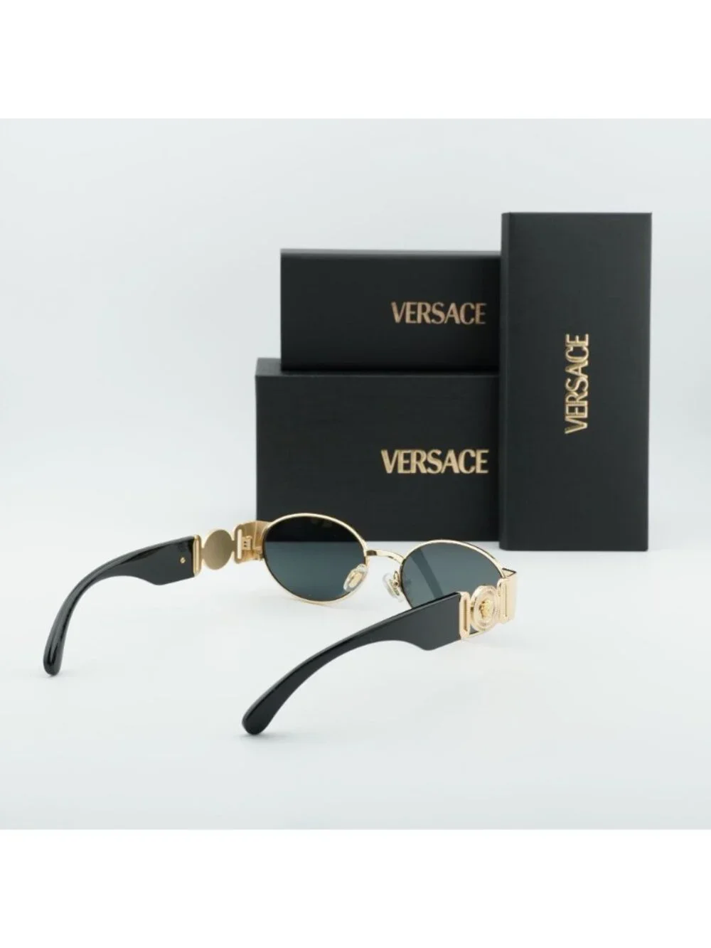 Versace VE2299 1002/87 Sunglasses Gold Oval Frame, Grey Lenses